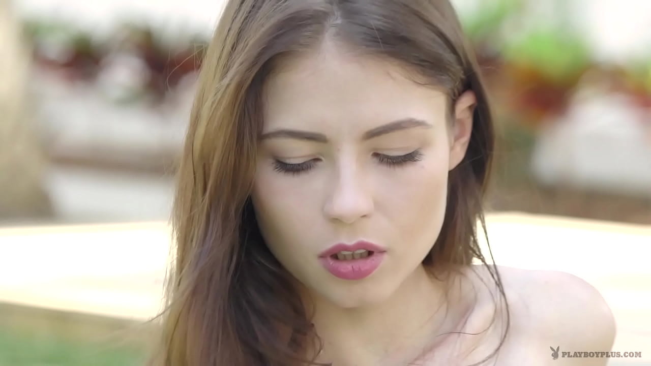 Tight brunette teen Hilary C stripping by the pool